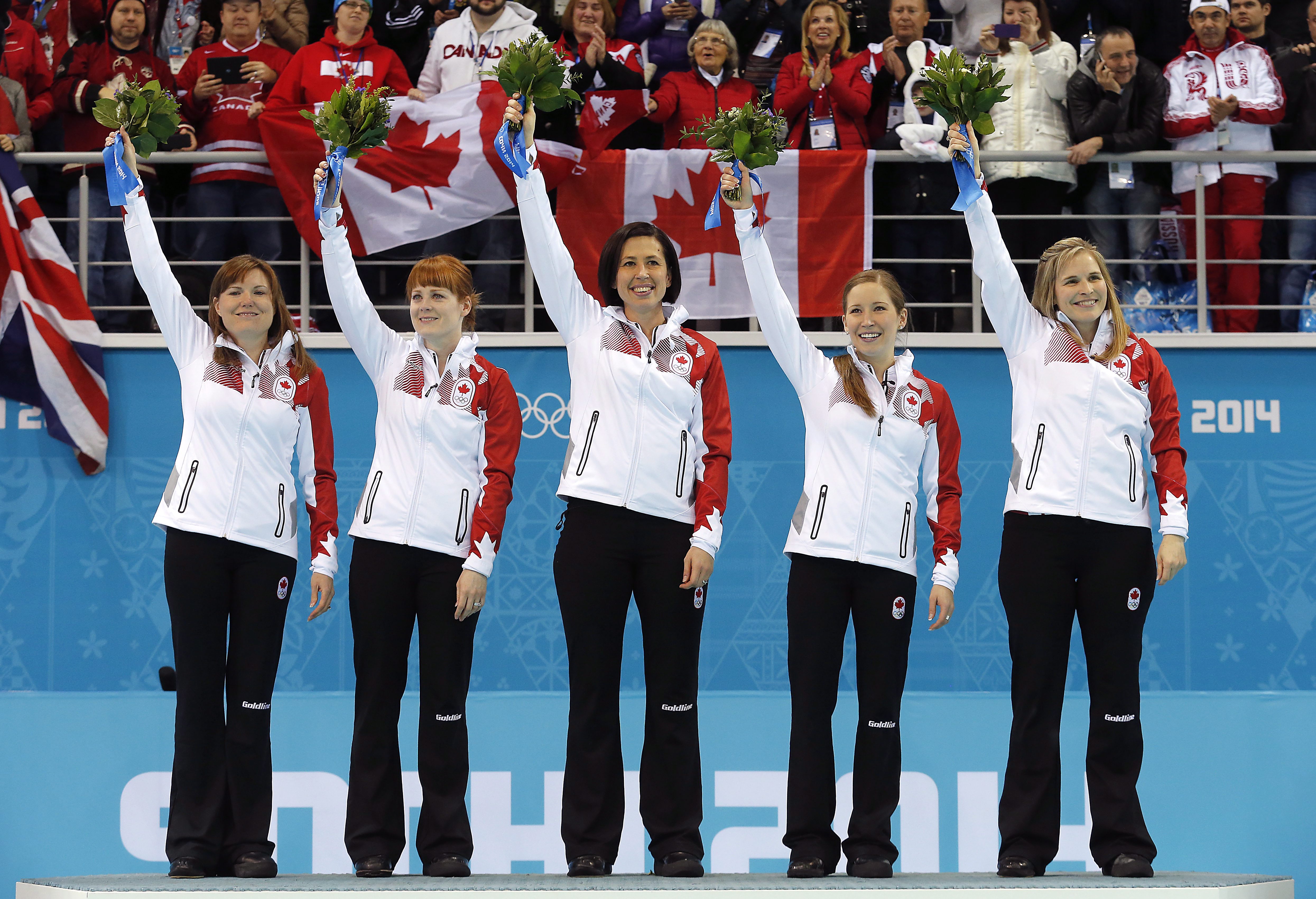 Des athlètes sur un podium