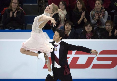 Kaitlyn Weaver et Andrew Poje (Crédit photo: THE CANADIAN PRESS/Jonathan Hayward)