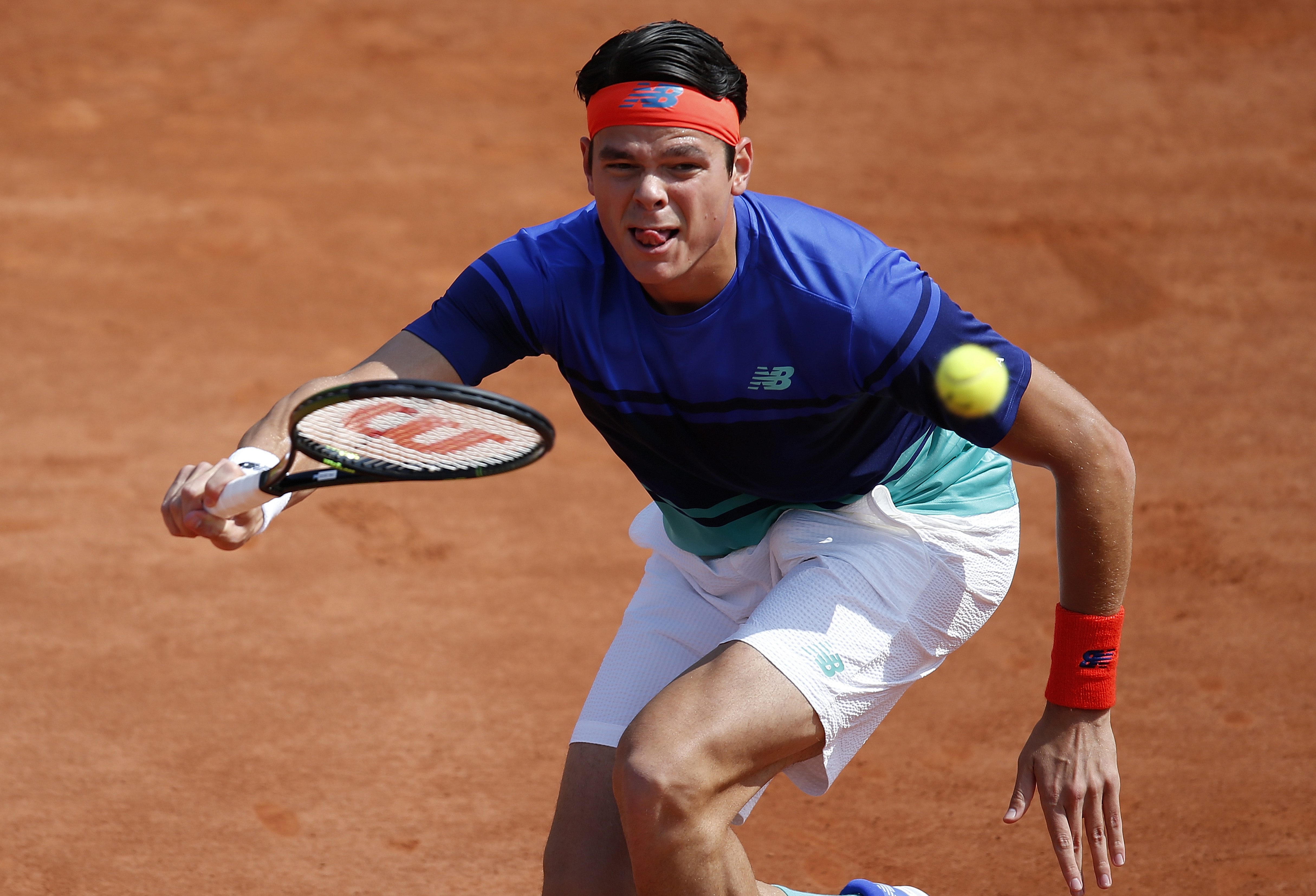 contre le Slovaque Andrej Martin au troisième tour de Roland-Garros le vendredi 27 mai 2016 à Paris. (AP Photo/Alastair Grant)