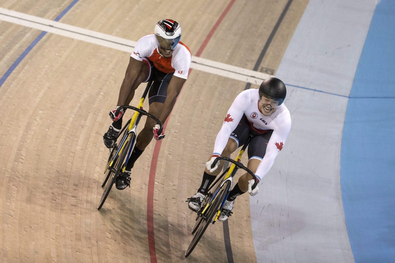 Hugo Barrette (droite) lors de la finale du sprint aux Jeux panaméricains de Toronto, le 18 juillet 2015. THE CANADIAN PRESS/Chris Young