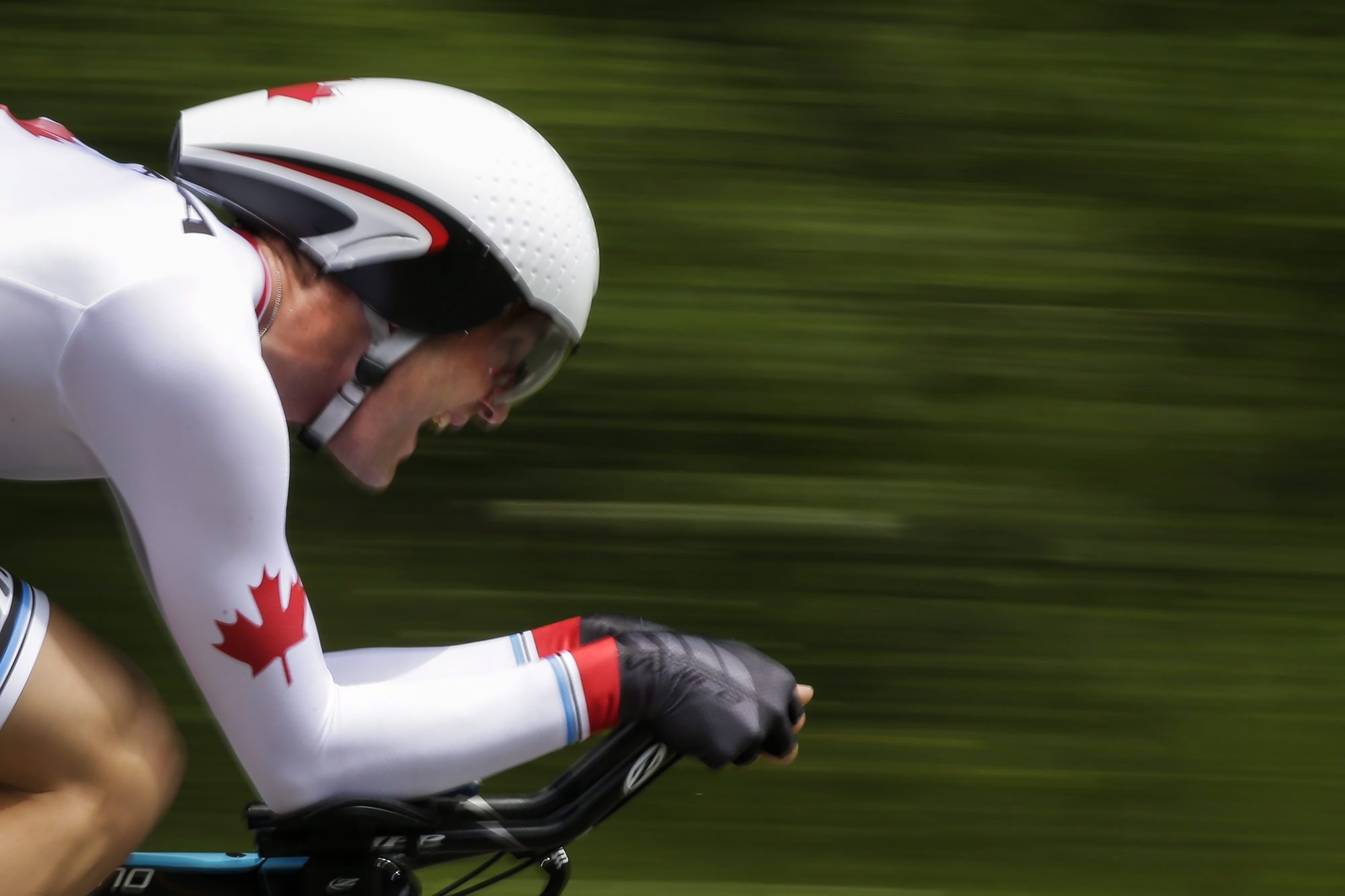 Le Canadien Hugo Houle lors de l’épreuve individuelle masculine du contre-la-montre aux Jeux panaméricains de 2015 à Toronto. Houle remporta l’or. (AP Photo/Felipe Dana)