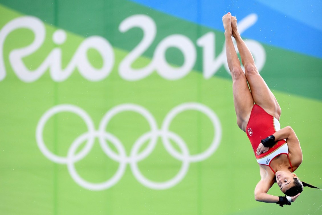 La Chine en action à la poutre lors des qualifications à Tokyo 2020