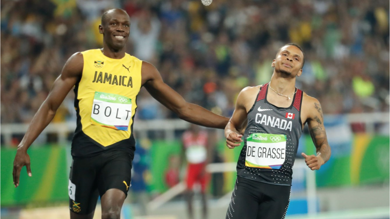Bolt félicite son ami De Grasse après la demi-finale du 100 m, le 14 août 2016.
