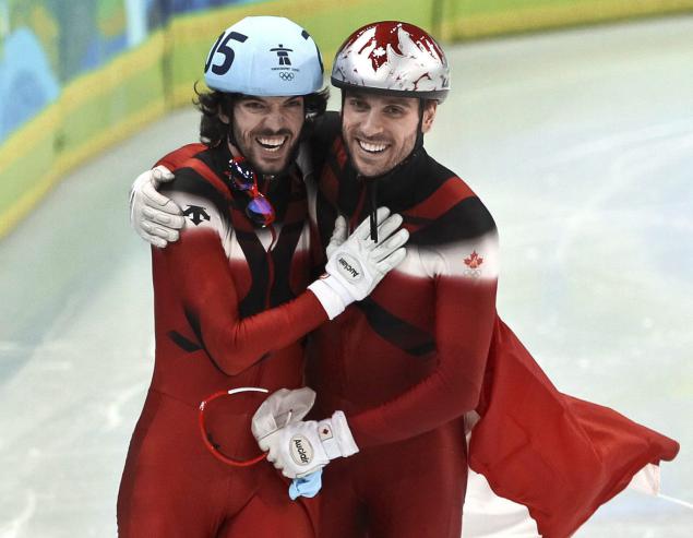 Charles Hamelin (gauche) et François-Louis Tremblay (droite) durant les Jeux de Vancouver. (PC/Tara Walton)