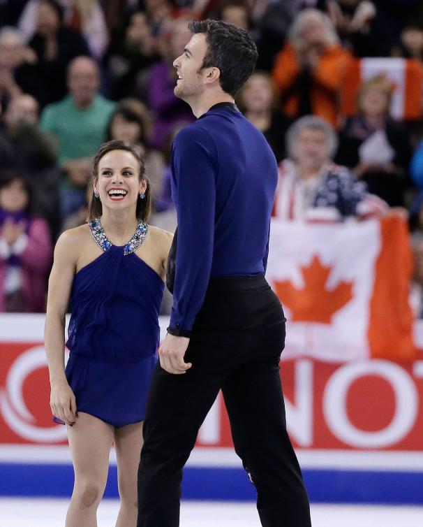 Meagan Duhamel et Eric Radford sont soulagés après une belle performance aux Championnats du monde en 2016.