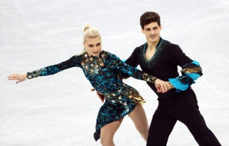 Piper Gilles et Paul Poirier patinent leur programme court de danse sur glace aux Jeux olympiques de PyeongChang, le 19 février 2018. Photo COC/Vaughn Ridley