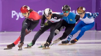 Samuel Girard lors des préliminaires au relais 5000 m hommes aux Jeux olympiques de PyeongCHang, le 13 février 2018. LA PRESSE CANADIENNE/Paul Chiasson