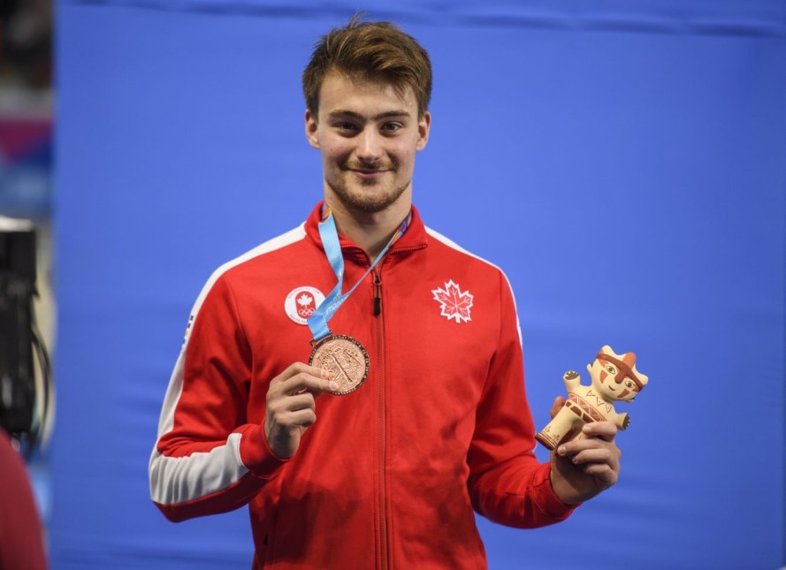 Philippe Gagné et sa médaille de bronze du 3 m masculin