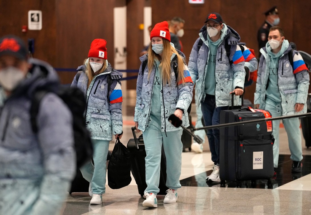 Des athlètes du Comité olympique russe à leur départ l'aéroport.