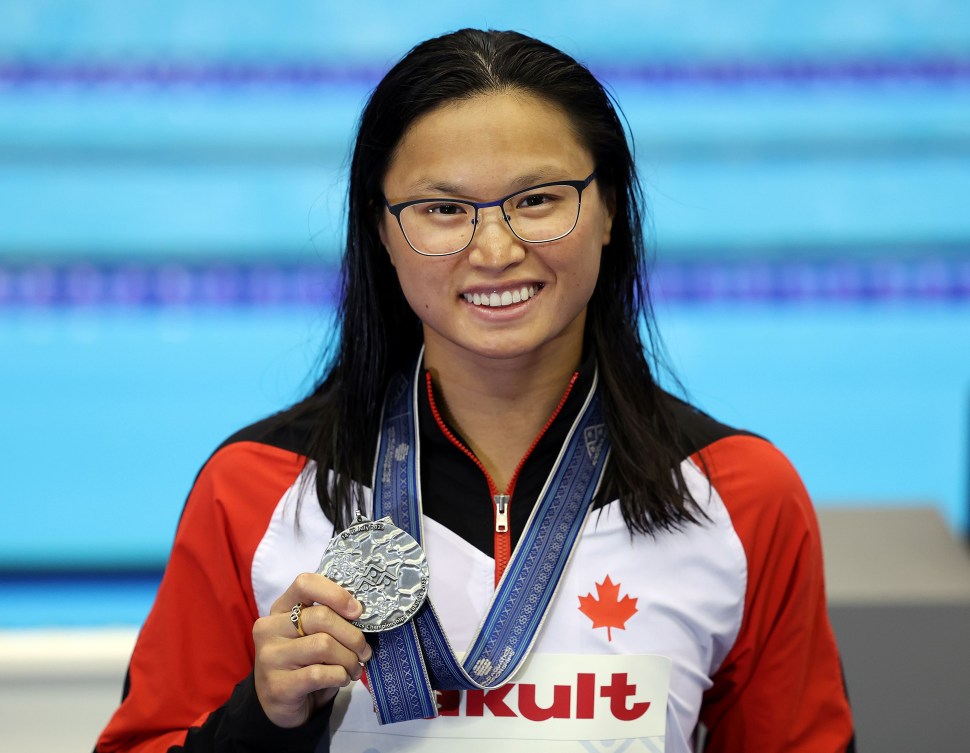 Maggie Mac Neil with her silver medal.