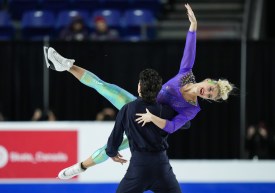 Le duo de patineurs Piper Gilles et Paul Poirier en pleine compétition en danse sur glace.
