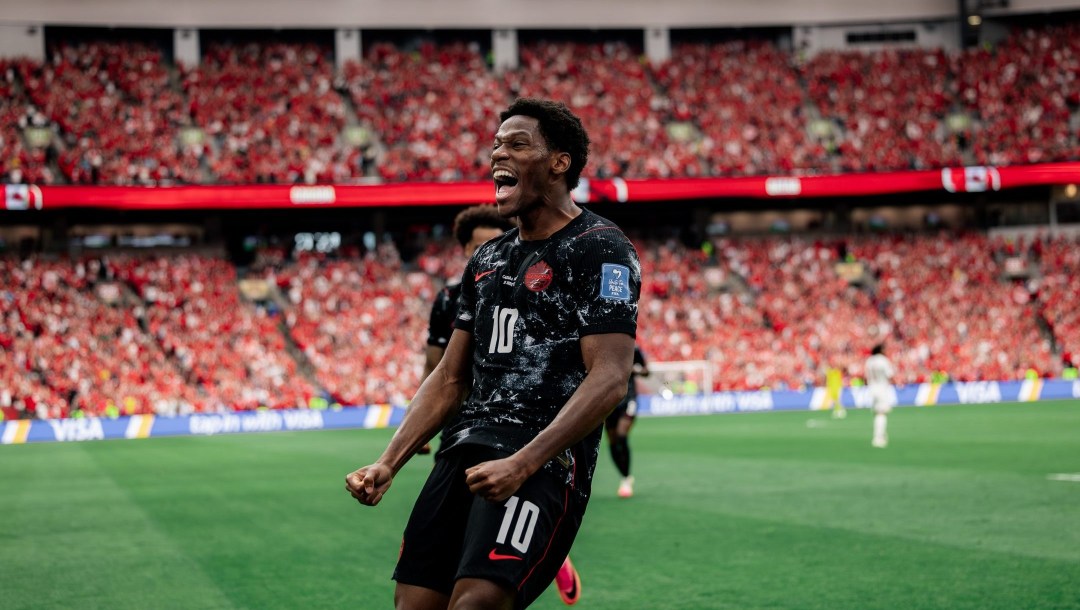 Jonathan David celebrates scoring against Qatar on Thursday.